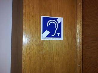 hearing loop sticker on surgery door